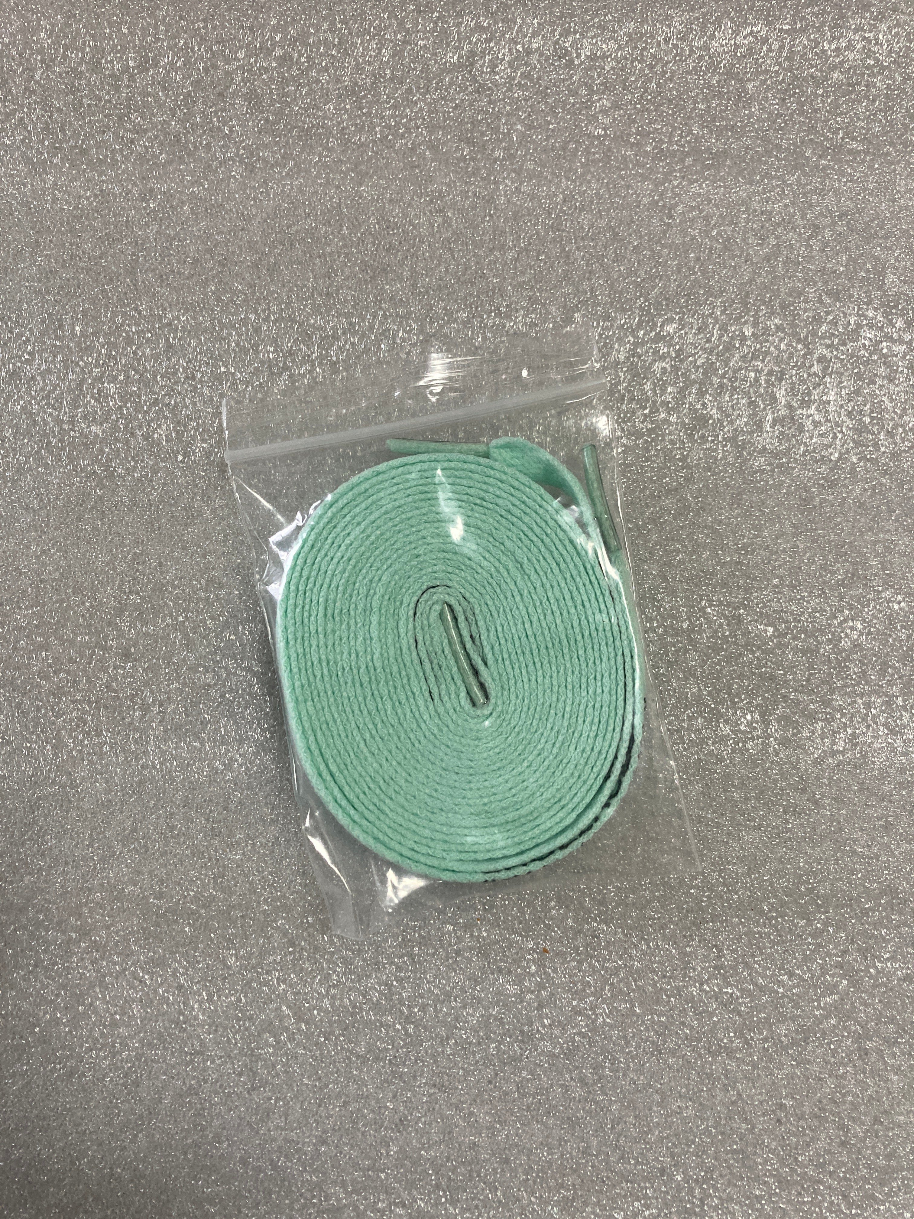 Nike shoes with light green shoelaces (&1